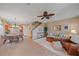 Open living area with staircase, dining space, and tile flooring at 3760 82Nd Avenue E Cir # 101, Sarasota, FL 34243
