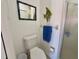Bathroom featuring a toilet and a glass-doored shower at 4440 47Th W Ave # 204, Bradenton, FL 34210