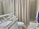 Bathroom featuring a vanity with a granite countertop and shower with curtain at 4440 47Th W Ave # 204, Bradenton, FL 34210