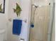 Bathroom featuring a glass-doored shower at 4440 47Th W Ave # 204, Bradenton, FL 34210