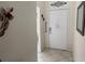 Entryway showcasing the front door, tile flooring, and decorative wall art at 4440 47Th W Ave # 204, Bradenton, FL 34210