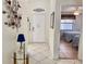 Inviting entryway with decor and access to a bedroom featuring two twin beds at 4440 47Th W Ave # 204, Bradenton, FL 34210