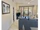 Cozy living room with balcony access, modern furnishings, and serene decor at 4440 47Th W Ave # 204, Bradenton, FL 34210
