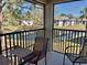 Relaxing patio with lake view, complete with table and chairs, perfect for outdoor dining at 4440 47Th W Ave # 204, Bradenton, FL 34210