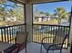Enjoy serene lake views from this screened patio with comfortable seating at 4440 47Th W Ave # 204, Bradenton, FL 34210