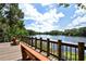 Scenic lake view from a waterfront deck, providing a serene escape into nature's beauty at 4712 Glenbrooke Dr, Sarasota, FL 34243