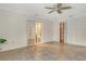 Large main bedroom includes ensuite bath, sliding mirrored closet, and open closet at 4712 Glenbrooke Dr, Sarasota, FL 34243