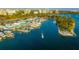 Aerial shot of the city's harbor, featuring a boardwalk, marina and cityscape in the background at 512 Laurel Park Dr, Sarasota, FL 34236