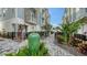 Charming townhome community with lush landscaping and paved walkways in a desirable location at 512 Laurel Park Dr, Sarasota, FL 34236