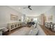 Open-concept living space boasts hardwood floors and flows seamlessly into the kitchen and dining area at 512 Laurel Park Dr, Sarasota, FL 34236
