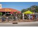 Mattison's City Grille featuring ample outdoor seating, attracting pedestrians to enjoy an urban environment at 512 Laurel Park Dr, Sarasota, FL 34236