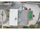 Aerial view of home showcasing the roof and an overview of the pool and backyard at 55 N Washington Dr, Sarasota, FL 34236