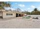 Spacious backyard with a pool, patio, and lush landscaping for relaxing outdoors at 55 N Washington Dr, Sarasota, FL 34236