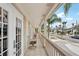 Inviting balcony with comfortable seating and scenic neighborhood views at 55 N Washington Dr, Sarasota, FL 34236