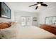 Bedroom featuring a ceiling fan, french doors, and neutral color palette at 55 N Washington Dr, Sarasota, FL 34236
