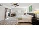 Bright bedroom with sliding glass doors and a ceiling fan at 55 N Washington Dr, Sarasota, FL 34236