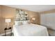 Bright bedroom with a queen-size bed, ample lighting, and tasteful contemporary accents at 55 N Washington Dr, Sarasota, FL 34236