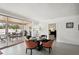 Cozy dining area with outdoor access, featuring a round table with seating for four at 55 N Washington Dr, Sarasota, FL 34236