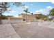 Charming two-story home with an attached garage and spacious driveway at 55 N Washington Dr, Sarasota, FL 34236