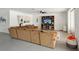 Bright living room featuring comfortable seating and an entertainment center at 55 N Washington Dr, Sarasota, FL 34236