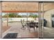 Outdoor patio with view of the swimming pool and ample seating at 55 N Washington Dr, Sarasota, FL 34236