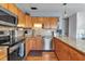 Bright and efficient kitchen with ample cabinetry and granite counters, designed for culinary enthusiasts at 5955 Midnight Pass Rd # 18E, Sarasota, FL 34242