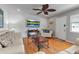 Relaxing living room highlighting hardwood floors and comfortable seating, creating an inviting space at 5955 Midnight Pass Rd # 18E, Sarasota, FL 34242