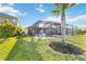 The screened pool area offers a private backyard oasis for relaxation and outdoor living at 6161 Anise Dr, Sarasota, FL 34238