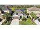 Beautiful single Gathering home with mature landscaping and a lovely water view at 6161 Anise Dr, Sarasota, FL 34238