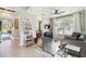Inviting living area with ample seating, tile flooring, and access to the dining area at 6161 Anise Dr, Sarasota, FL 34238