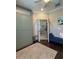 Bright office features natural light, modern decor and double french doors at 6161 Anise Dr, Sarasota, FL 34238