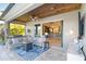 Spacious outdoor patio with a grill, comfortable seating, and seamless access to the indoors at 6161 Anise Dr, Sarasota, FL 34238