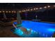 A beautifully lit screened pool area with elegant furniture provides the ultimate outdoor experience for everyone at 6161 Anise Dr, Sarasota, FL 34238