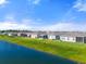 Aerial view highlights the community's peaceful lake and waterfront homes at 6306 115Th E Ave, Parrish, FL 34219