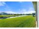 Expansive backyard overlooking the water, perfect for outdoor enjoyment at 6306 115Th E Ave, Parrish, FL 34219