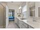 Beautiful bathroom with double sinks, modern fixtures, and a glass-enclosed shower at 6306 115Th E Ave, Parrish, FL 34219