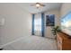 Bedroom featuring bright curtains, a ceiling fan, and a modern TV at 6306 115Th E Ave, Parrish, FL 34219