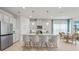 Modern kitchen featuring granite countertops, stainless steel appliances, and a breakfast bar at 6306 115Th E Ave, Parrish, FL 34219