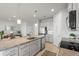 Well-designed kitchen featuring granite countertops, stainless steel appliances, and ample cabinet space at 6306 115Th E Ave, Parrish, FL 34219