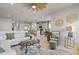 Open-concept living area with view to kitchen and lots of natural light at 6306 115Th E Ave, Parrish, FL 34219