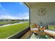 Relaxing screened patio offers tranquil water views and stylish decor at 6306 115Th E Ave, Parrish, FL 34219