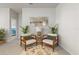Sitting area with decorative mirrors, lamps, plants and comfortable chairs at 6306 115Th E Ave, Parrish, FL 34219
