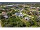 Aerial view of residential neighborhood showcasing the house and neighboring properties at 6320 Tilly St, Englewood, FL 34224