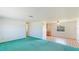 Open-concept living space with neutral paint, ceiling fan, tile floors, and an inviting and airy atmosphere at 6349 5Th Street E Cir, Bradenton, FL 34203