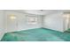 Bright living room with neutral paint and plush carpet at 6349 5Th Street E Cir, Bradenton, FL 34203