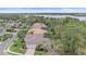 A high angle shows residential homes with well-manicured lawns, landscaping, and screened-in pool areas at 6617 Nautical Dr, Lakewood Ranch, FL 34202