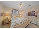 Bedroom with floral bedding and matching dressers at 6617 Nautical Dr, Lakewood Ranch, FL 34202