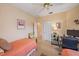 Spare bedroom with twin beds, a desk, and easy access to additional rooms at 6617 Nautical Dr, Lakewood Ranch, FL 34202