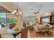 Comfortable living room with stylish furnishings and a view of the outdoor pool and lanai at 6617 Nautical Dr, Lakewood Ranch, FL 34202