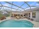 Outdoor screened pool and patio area with furniture and ample space for entertaining and relaxing at 6617 Nautical Dr, Lakewood Ranch, FL 34202